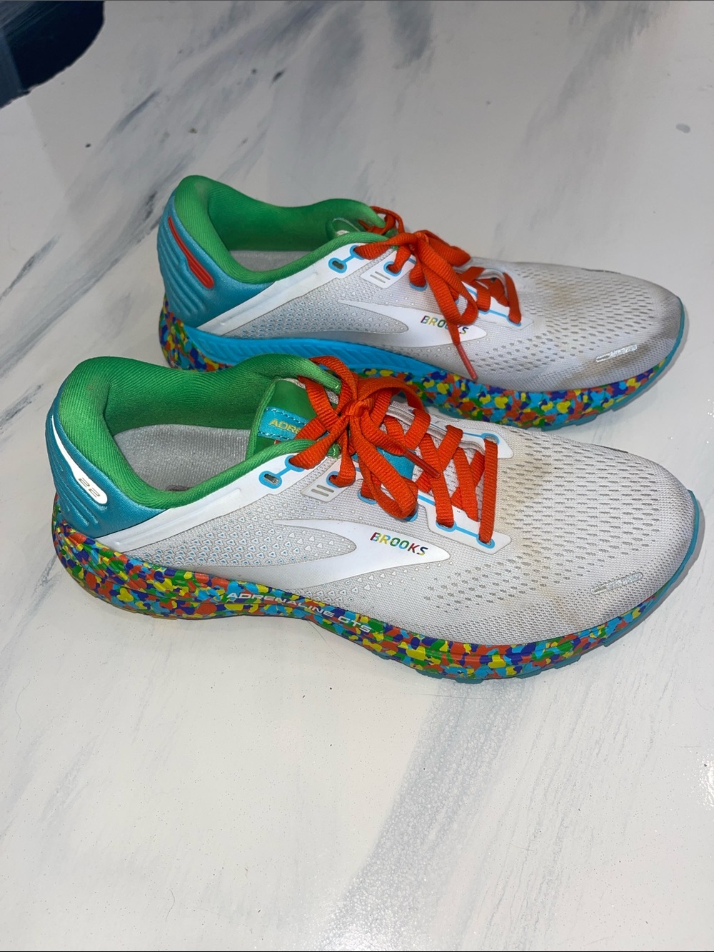 Brooks womens White Sneakers with Green Lining and Orange Laces